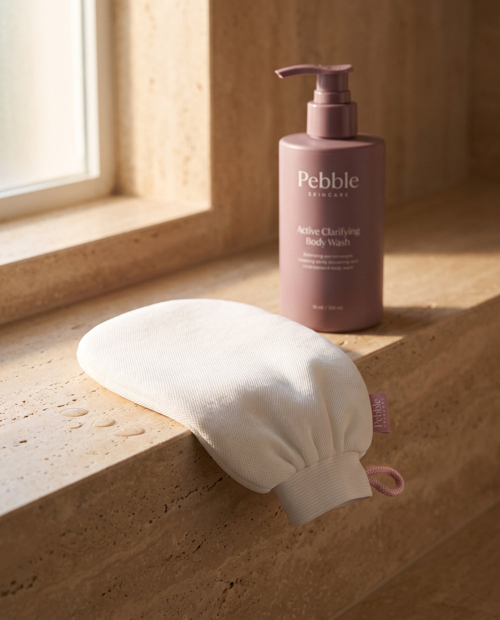 Pebble Exfoliating Glove with the Active Clarifying Body Wash
