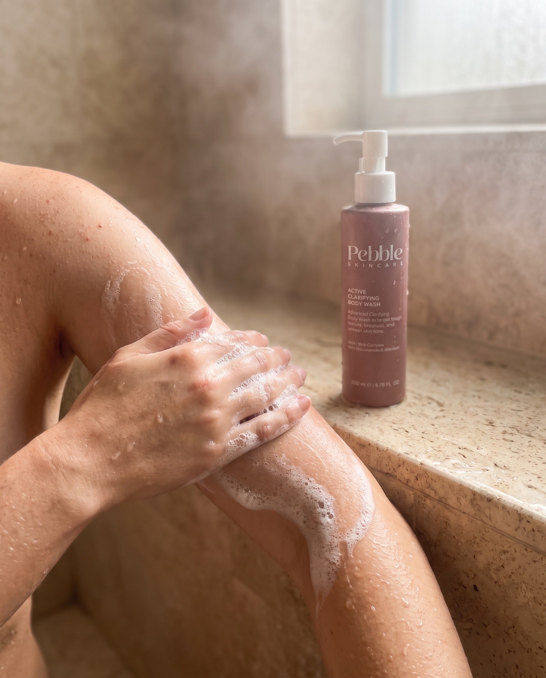 Lathering the Active Clarifying Body Wash in the shower