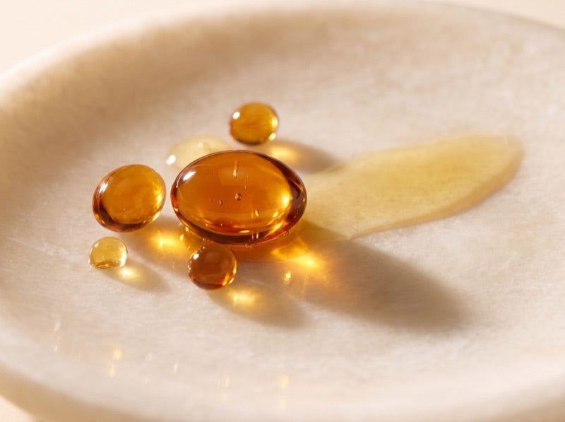 Vitamin E golden droplets